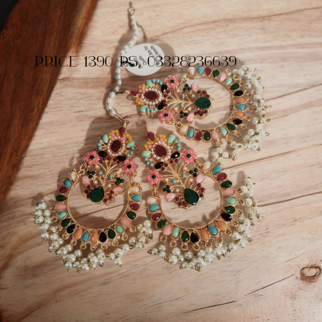 Gorgeous Nauratan bindiya and earrings